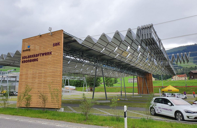 Foldable solar installation built over a parking
                lot, Jakobsbad in Appenzell Innerrhoden (Switzerland)