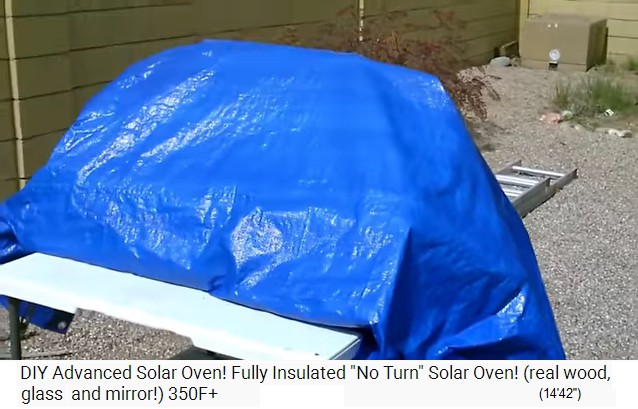 The solar oven outside under a blue
                  protection foil
