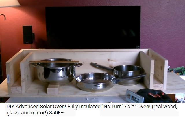 El marco del horno solar con 3 ollas grandes