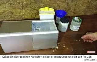 2 glasses
                    are already full with coconut oil, a third is behind
                    it with a funnel