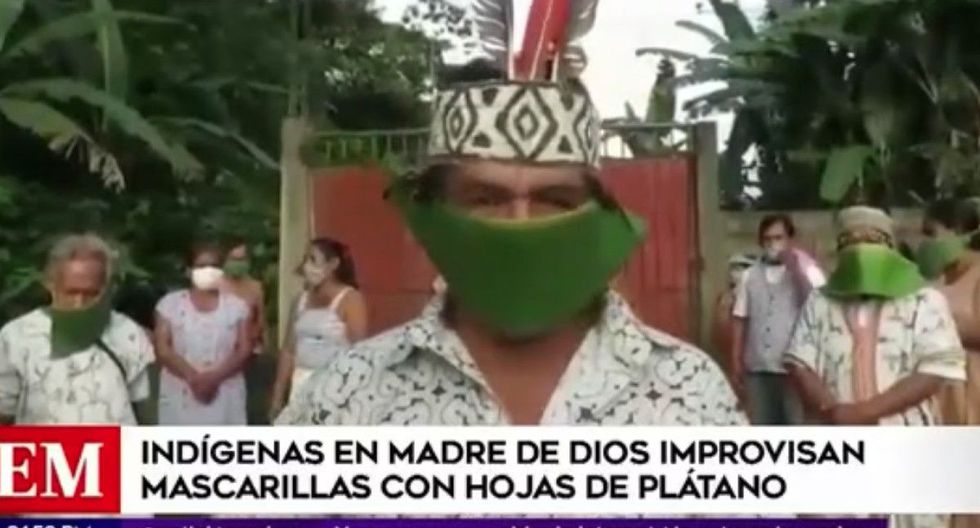 Corona19-Panik: Ureinwohner mit Masken aus
                  Bananenstaudenbl�ttern, Madre de Dios, Peru, 17. April
                  2020