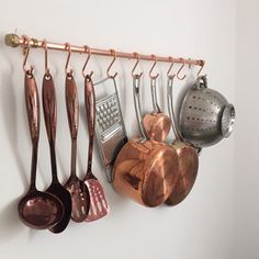 Copper
                                    kitchen appliances on a copper wall
                                    frame 02