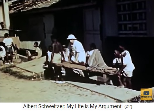 Spitaldorf Lambarene,
                    ein Patient wird auf einer Holzbahre getragen