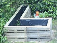 Bancal elevado
                          hecho con paletas con una l�mina protector