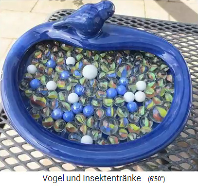 Insektentr�nke mit Murmeln in
                      einer Seifenschale