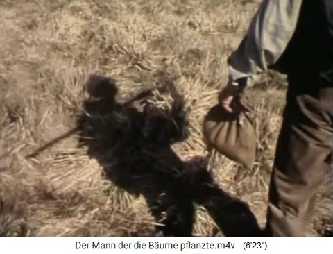 Bouffier (Filmdarsteller) mit der Eisenstange
                    und einem Sack Eicheln unterwegs in den S�dalpen 01