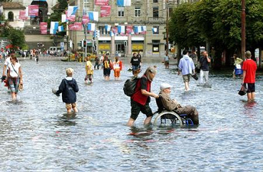 Flood in Switzerland of 2005 in
Lucerne: wheel chair in the flood Flood in Switzerland of 2005
in Lucerne: wheel chair in the flood