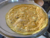 ... y la rana loca fue
                      llana como una tortilla.