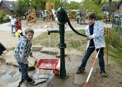 Water 04, a water pump in an old
                                style on the playground of Luebeck Path
                                (Lbecker Weg) in Krefeld-Uerdingen,
                                Germany