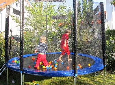 Trampoline 12: net trampoline with
                              balls in it, Germany