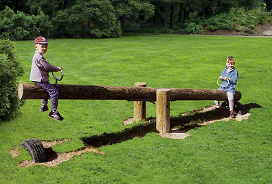 Seesaw 06 with tires
                              installed crossways in the soil, Sport
                              Thieme, Switzerland