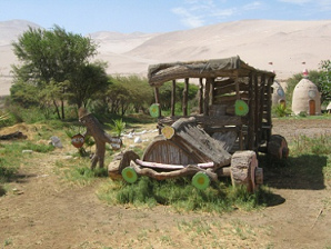 Car made of wood 01 on
                          Hari Krishna farm "Eco Truly" in
                          Lluta Valley near Arica in Chile